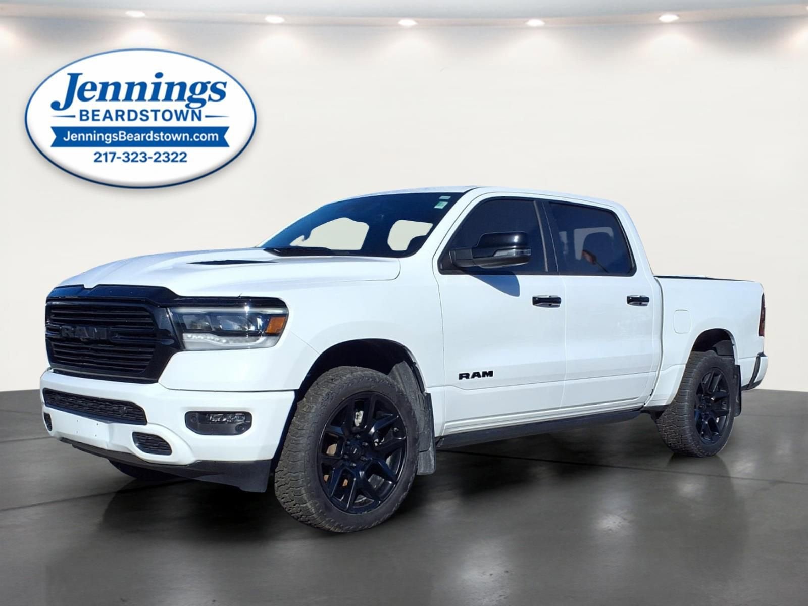2022 RAM 1500 Laramie in White — front three-quarter view